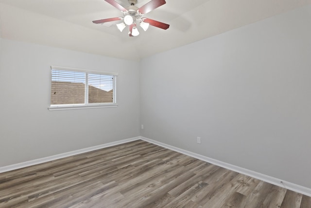 unfurnished room featuring ceiling fan and wood-type flooring