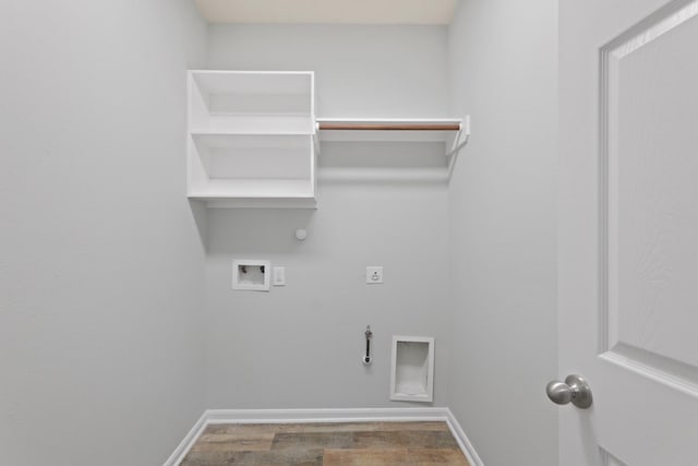 washroom with hookup for a gas dryer, hardwood / wood-style floors, washer hookup, and hookup for an electric dryer