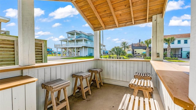 balcony featuring an outdoor bar