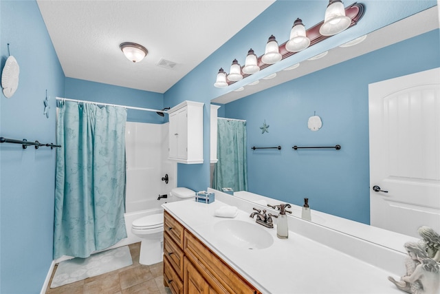 full bathroom featuring toilet, a textured ceiling, tile patterned flooring, shower / bath combo, and vanity