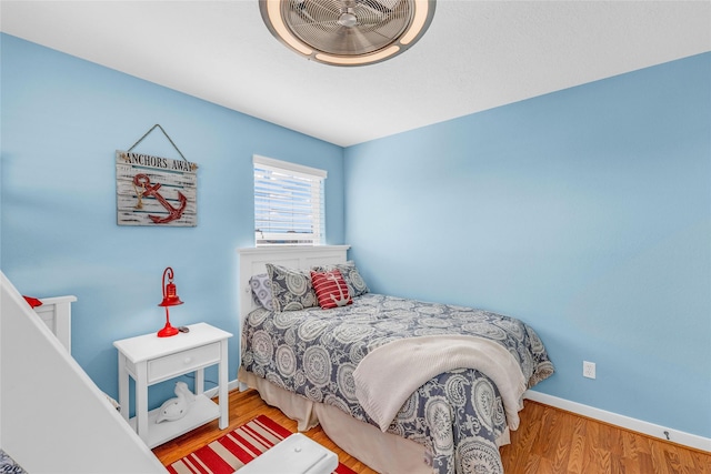 bedroom featuring hardwood / wood-style flooring