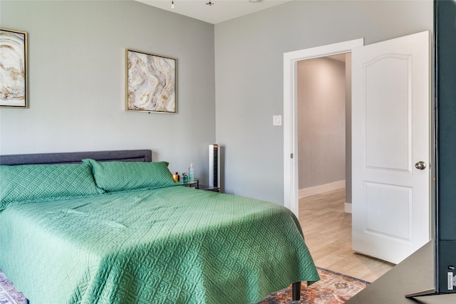 bedroom featuring light hardwood / wood-style floors