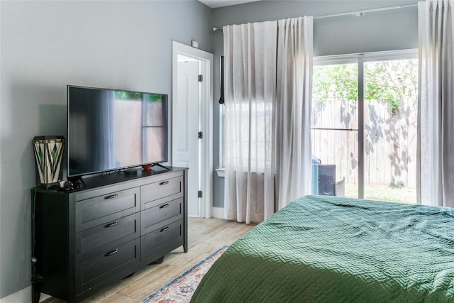 bedroom featuring light hardwood / wood-style floors