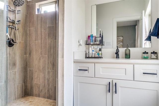 bathroom featuring vanity and walk in shower