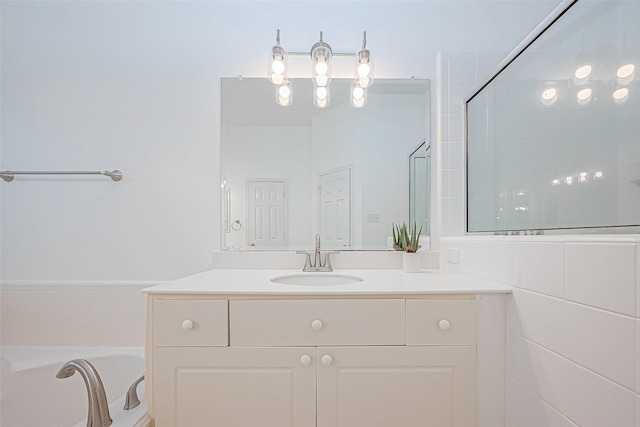 bathroom with a shower and vanity