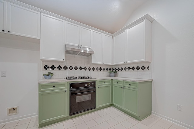 kitchen featuring white cabinets, tasteful backsplash, black oven, and stainless steel gas cooktop