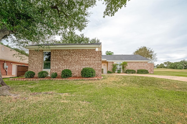 view of front of property with a front lawn