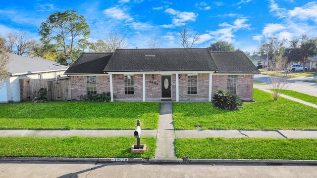 view of front of home with a front yard