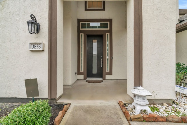 view of exterior entry with elevator