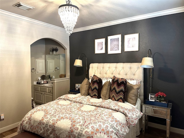 bedroom featuring a chandelier and ornamental molding