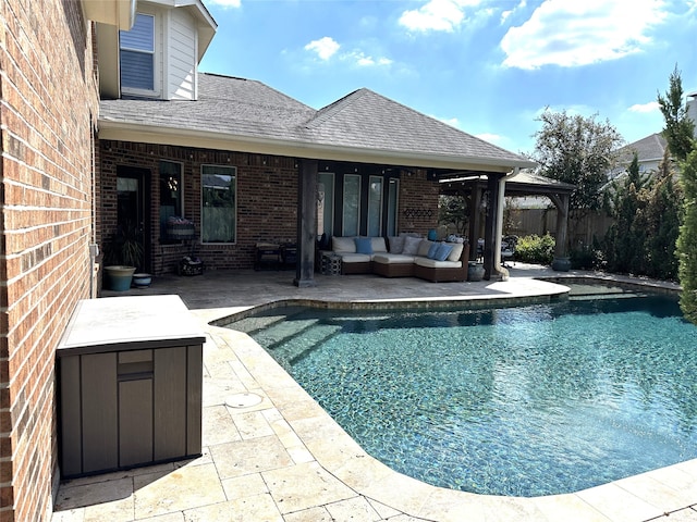 view of swimming pool featuring outdoor lounge area and a patio