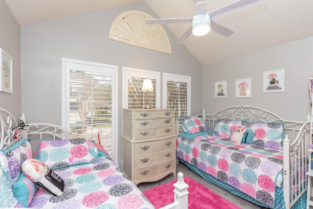 bedroom with lofted ceiling and ceiling fan