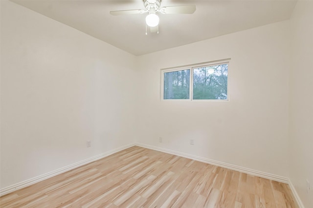 unfurnished room featuring ceiling fan and light wood-type flooring