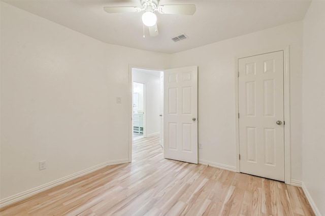 unfurnished bedroom featuring ceiling fan and light hardwood / wood-style flooring