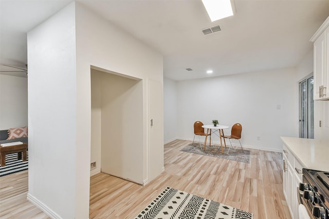 living area with light wood-type flooring