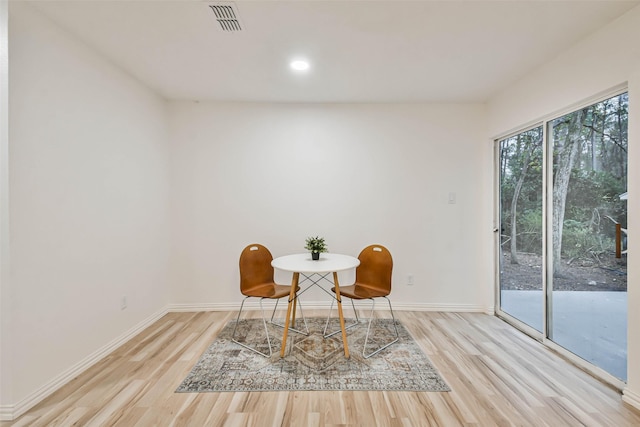 sitting room featuring light hardwood / wood-style floors