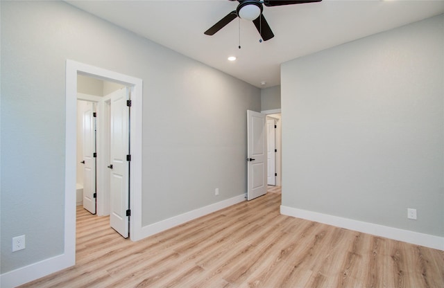 unfurnished bedroom featuring light hardwood / wood-style flooring and ceiling fan