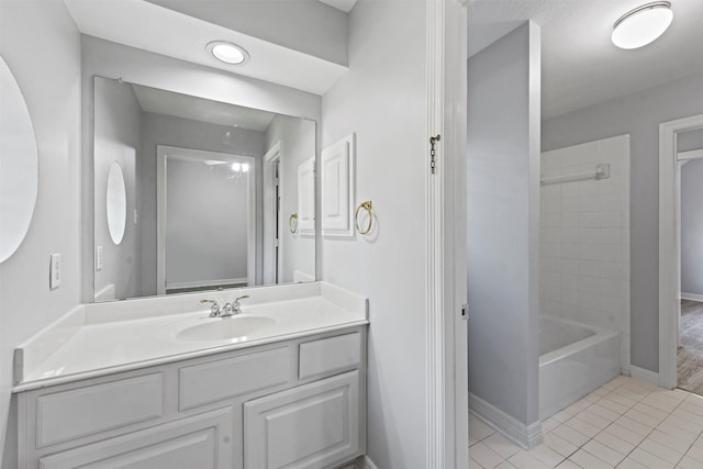 bathroom with tile patterned floors, vanity, and bathtub / shower combination