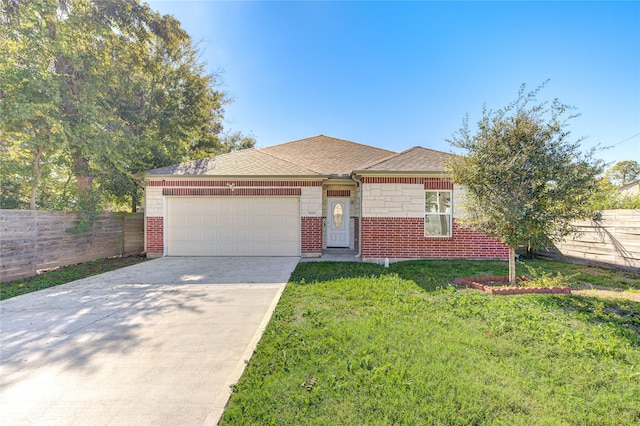 view of front of home with a front lawn and a garage