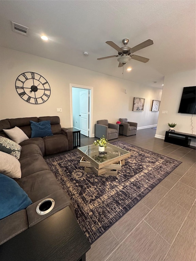 living room with ceiling fan