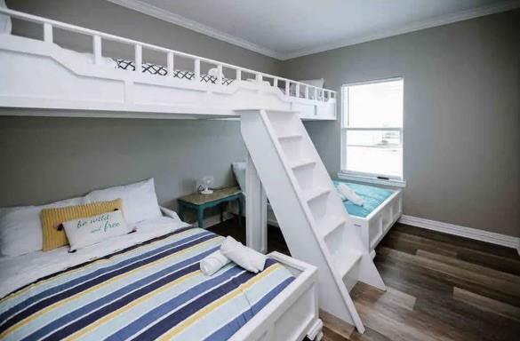 bedroom with dark wood-type flooring and ornamental molding