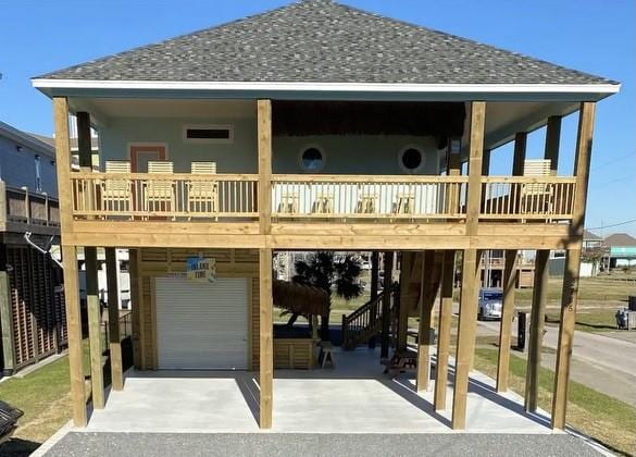 rear view of house featuring a carport