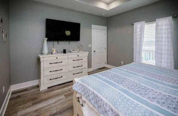 bedroom featuring hardwood / wood-style floors