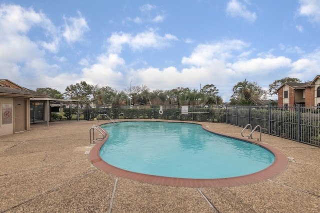 view of pool featuring a patio area