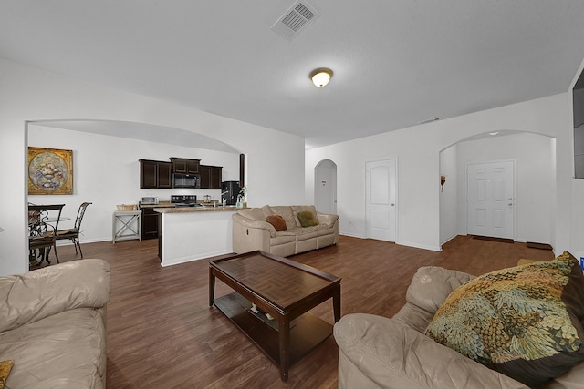 living room with dark wood-type flooring