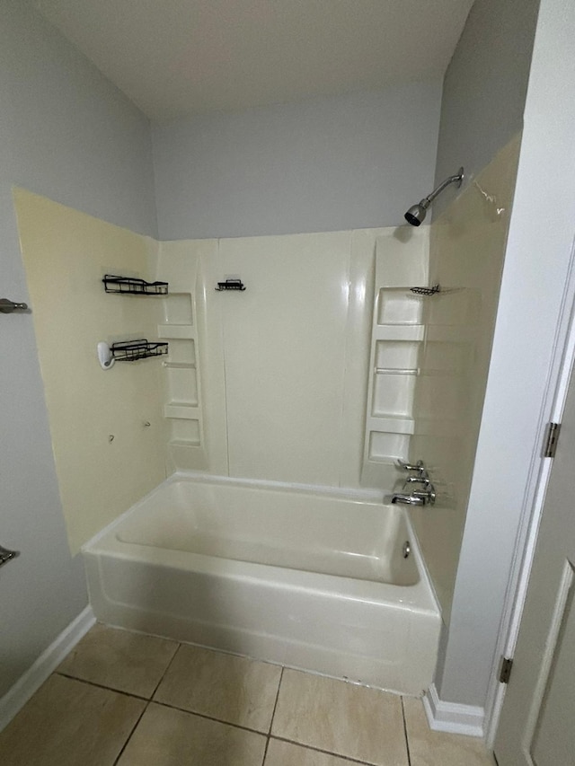 bathroom with tile patterned flooring and shower / bathtub combination