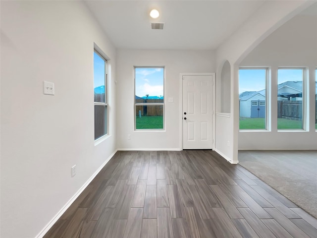 interior space with dark wood-type flooring