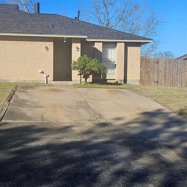 entrance to property with a patio area