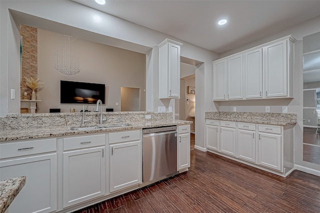 kitchen featuring dark hardwood / wood-style flooring, white cabinetry, dishwasher, and sink