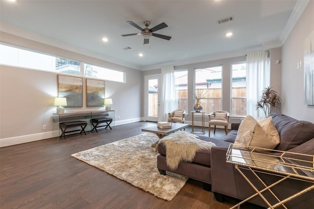 5636 Darling St, Houston, TX 77007 - living area featuring ornamental molding, baseboards, ceiling fan, dark wood-type flooring, and plenty of natural light