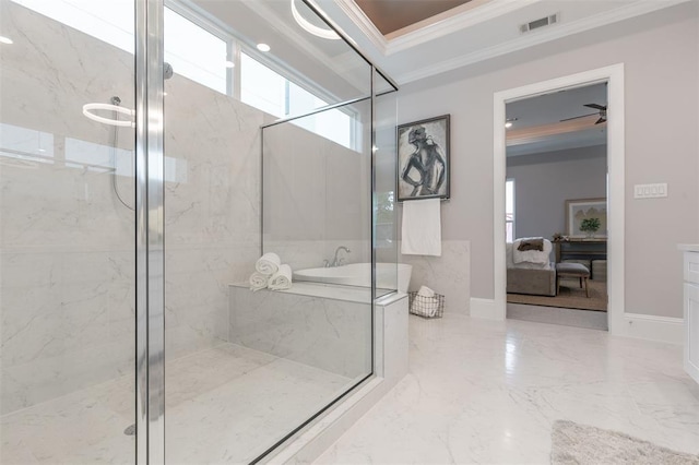 bathroom with a shower with shower door and ornamental molding