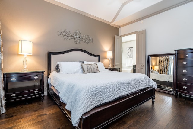 bedroom featuring dark hardwood / wood-style floors, ornamental molding, and vaulted ceiling