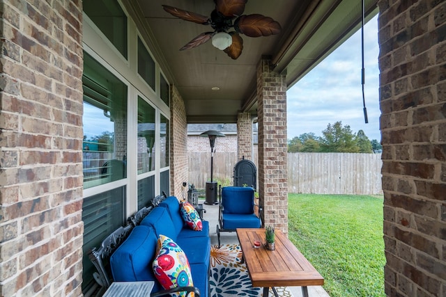 view of patio / terrace featuring ceiling fan and an outdoor hangout area