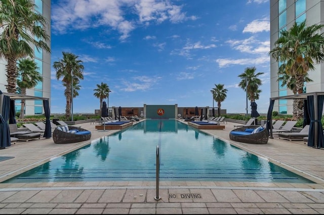 view of pool with a patio