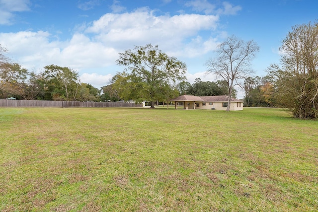 view of yard with fence