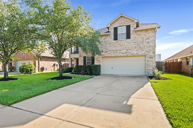 front facade with a garage and a front lawn