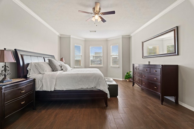 bedroom with ceiling fan, dark hardwood / wood-style flooring, a textured ceiling, and ornamental molding