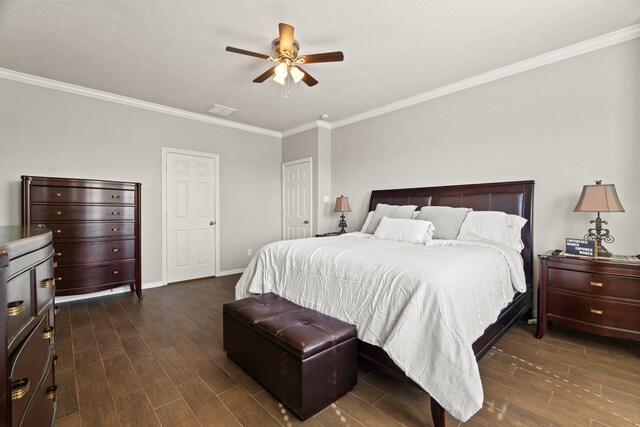 bedroom featuring ceiling fan, dark hardwood / wood-style floors, and ornamental molding