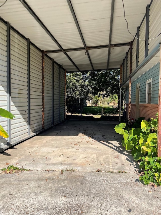 garage featuring a carport