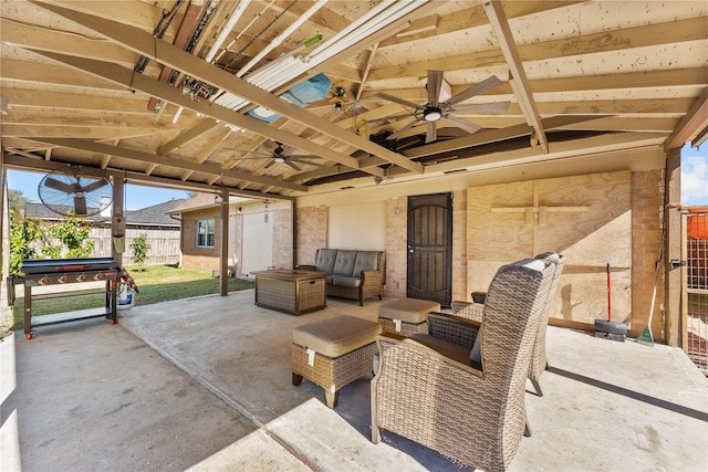 view of patio / terrace with an outdoor living space and ceiling fan