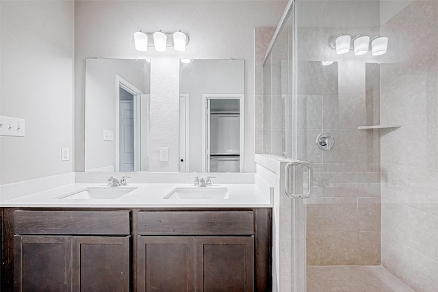 bathroom featuring vanity and walk in shower