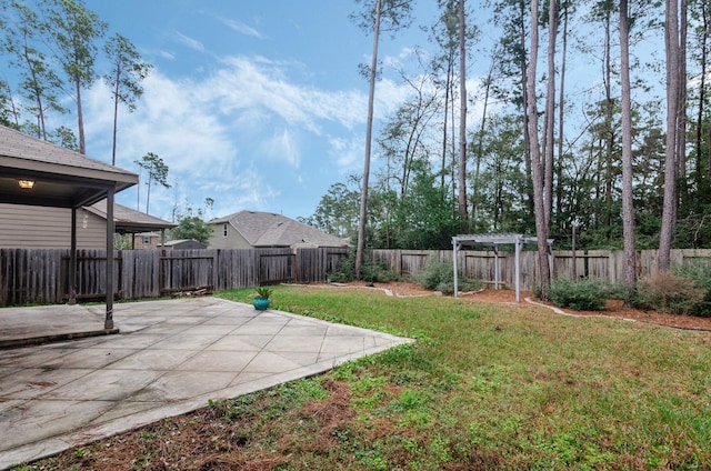 view of yard featuring a pergola and a patio