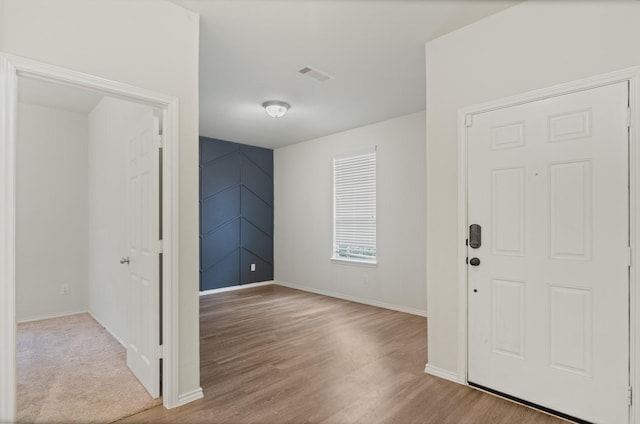 foyer featuring light hardwood / wood-style flooring