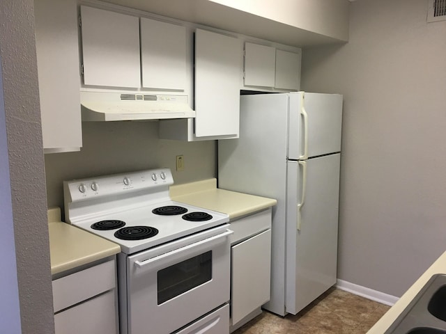 kitchen with white cabinets and white appliances