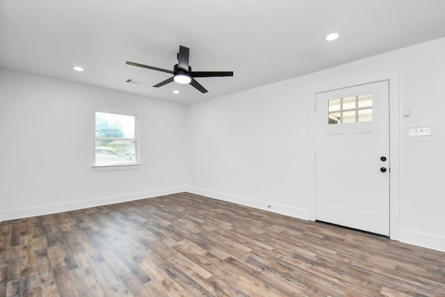 entryway with ceiling fan and dark hardwood / wood-style flooring