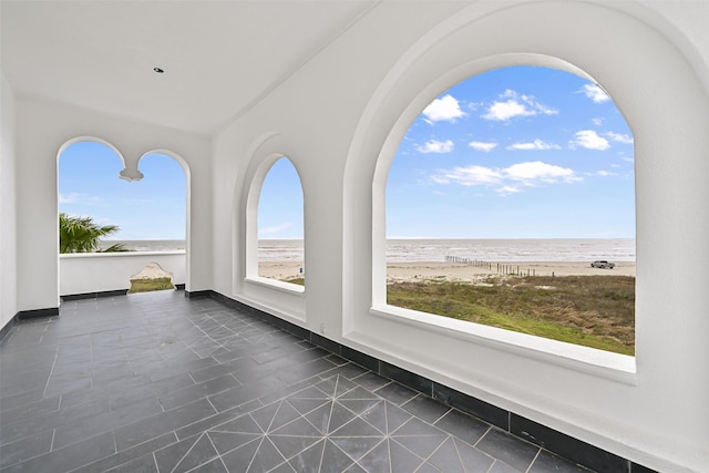 interior space featuring a view of the beach